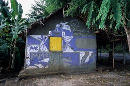 Archipel-des-Comores;-Architecture;-Case;-France;-Inscription;-Kaleidos;-Kaleidos-images;-La-parole-à-limage;-Laurent-Abad;-Mayotte;-Océan-Indien;-Peinture-bleue;-Rue;-Stories-Pictures;-Vie-quotidienne